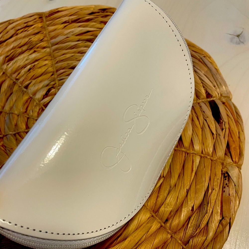 Jessica Simpson sunglasses white leather case.